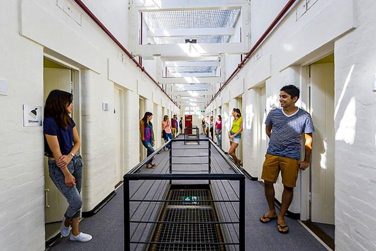 Backpackers lined up at Fremantle Prison Hostel YHA.