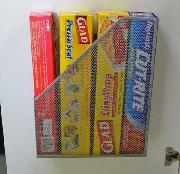 magazine rack used as cupboard storage idea for caravans