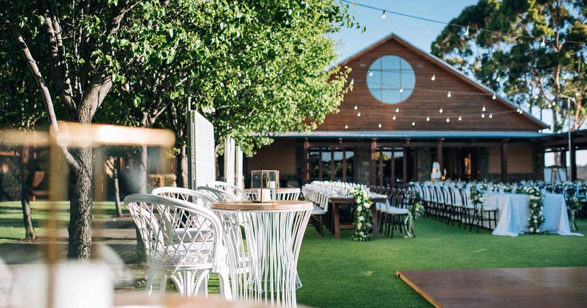 Wedding ceremony set up with table and chairs at Xanadu Wines in Margaret River.