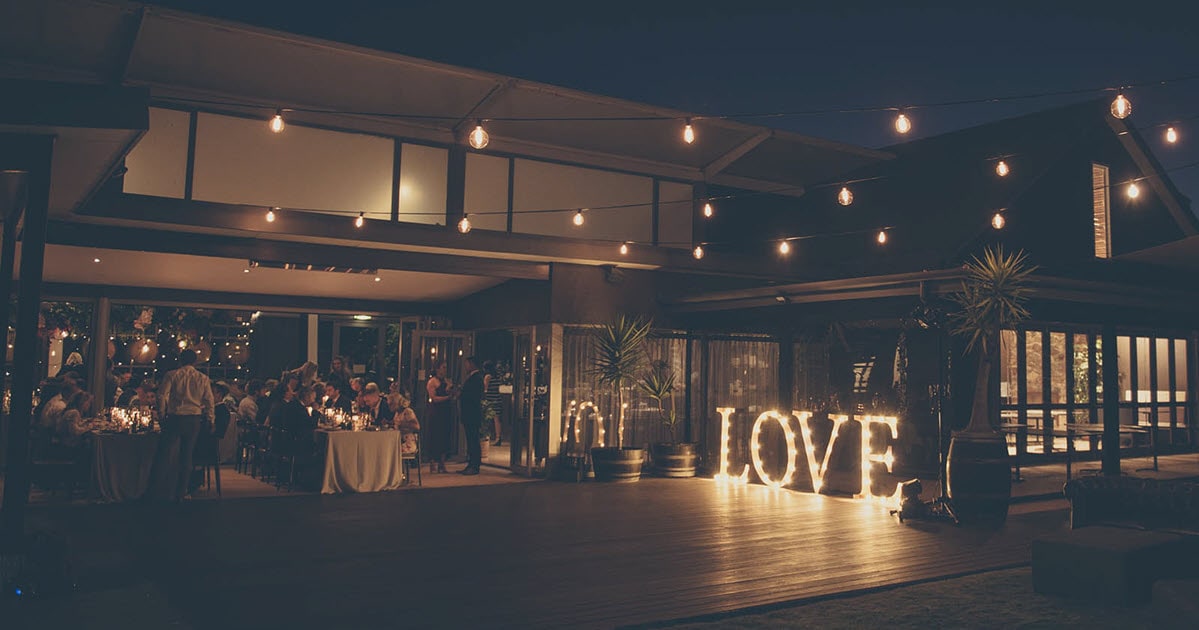 Wedding reception and glow up LOVE sign at Wills Domain.