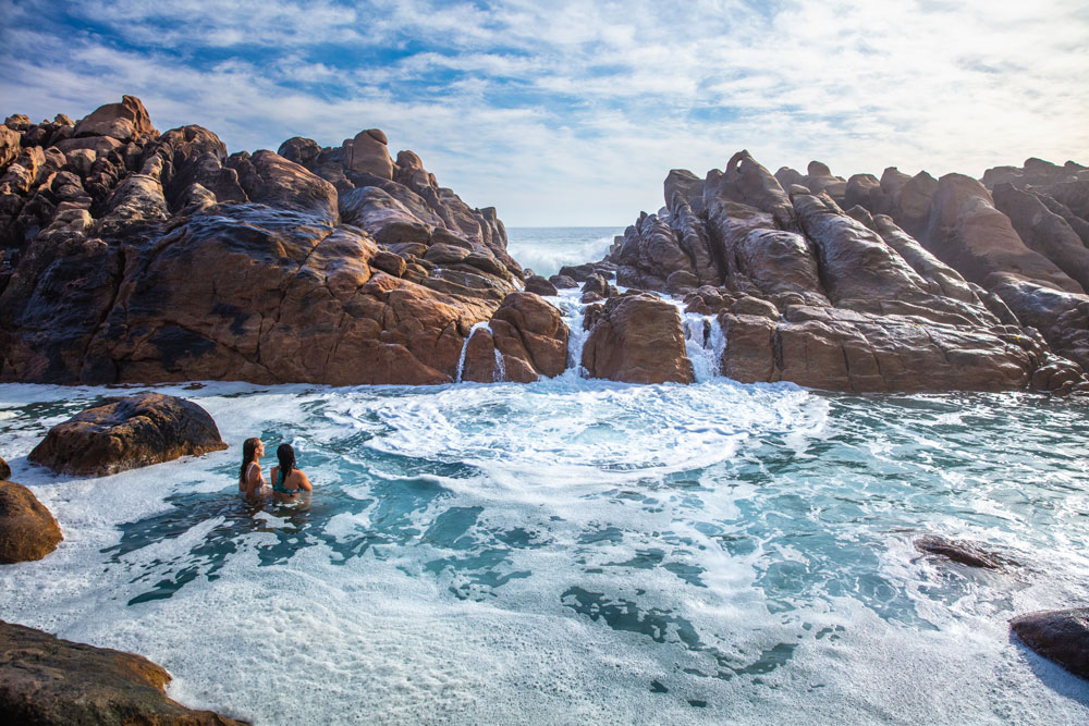 Enjoying the natural spa all to themselves. Injidup Beach, Western Australia.