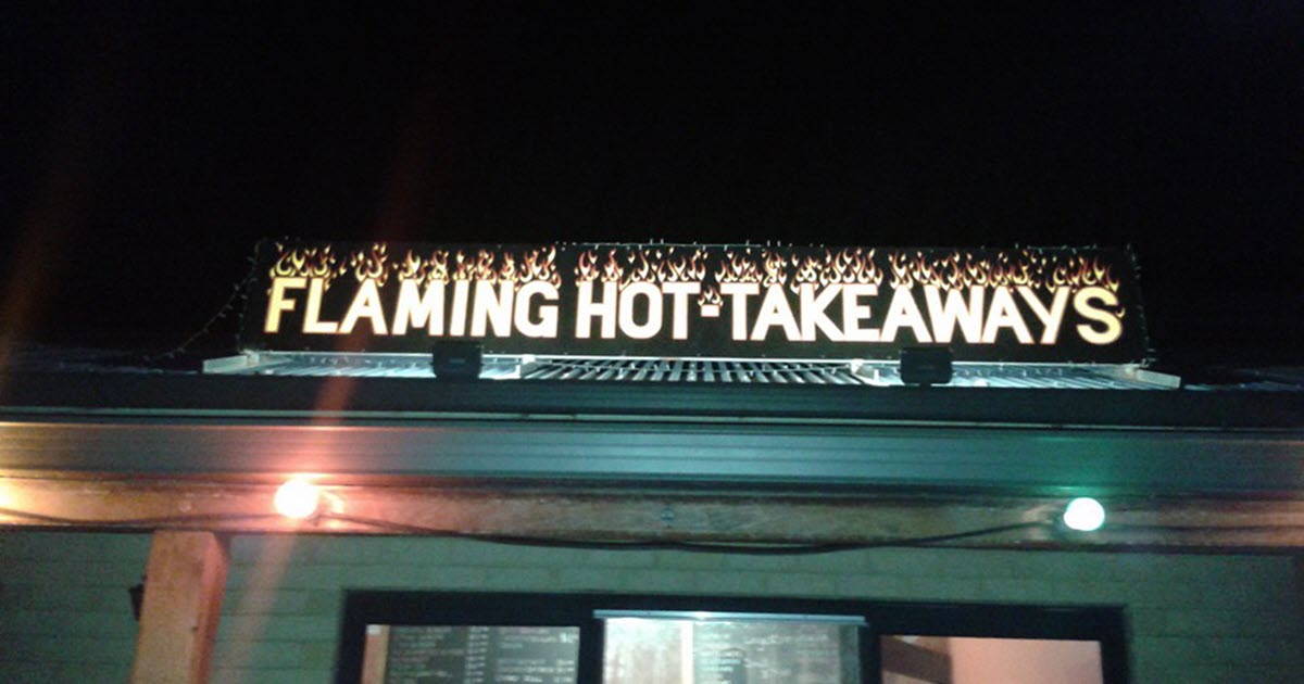 The sign on top of Flaming Hot-Takeaways restaurant in Walpole, Western Australia.